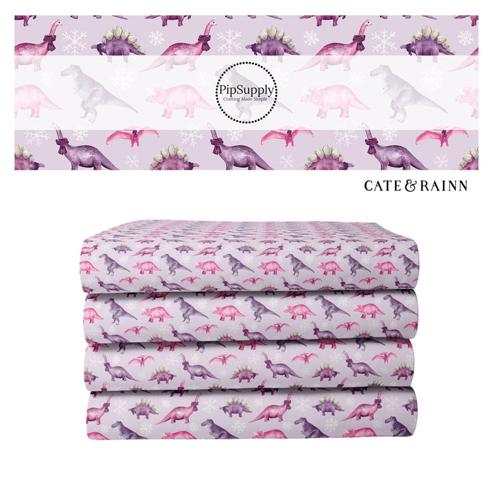 Purple fabric stack with pink and purple dinosaurs and snowflakes