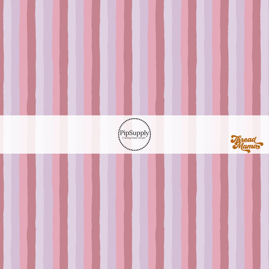 Muted pink and purple colored striped fabric by the yard pattern