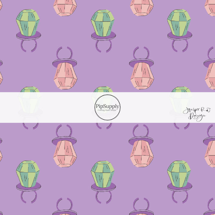 Purple fabric swatch with candy ring pops