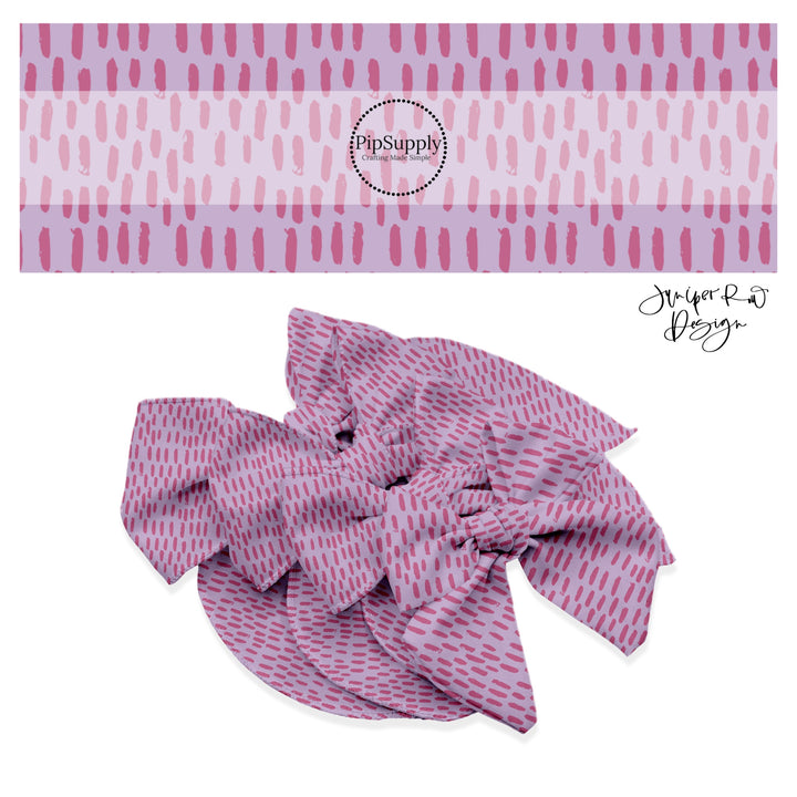 Drawn magenta dashes on lavender bow strips