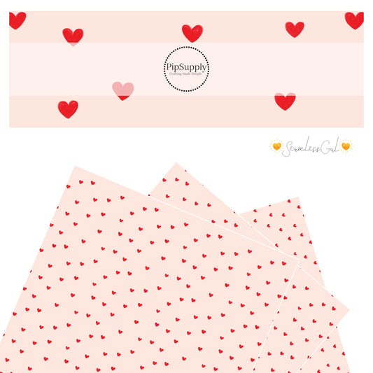 Drawn red hearts on cream faux leather sheet
