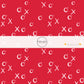White "XO" on red fabric by the yard pattern