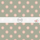 Sage green fabric by the yard with peach-colored daisies