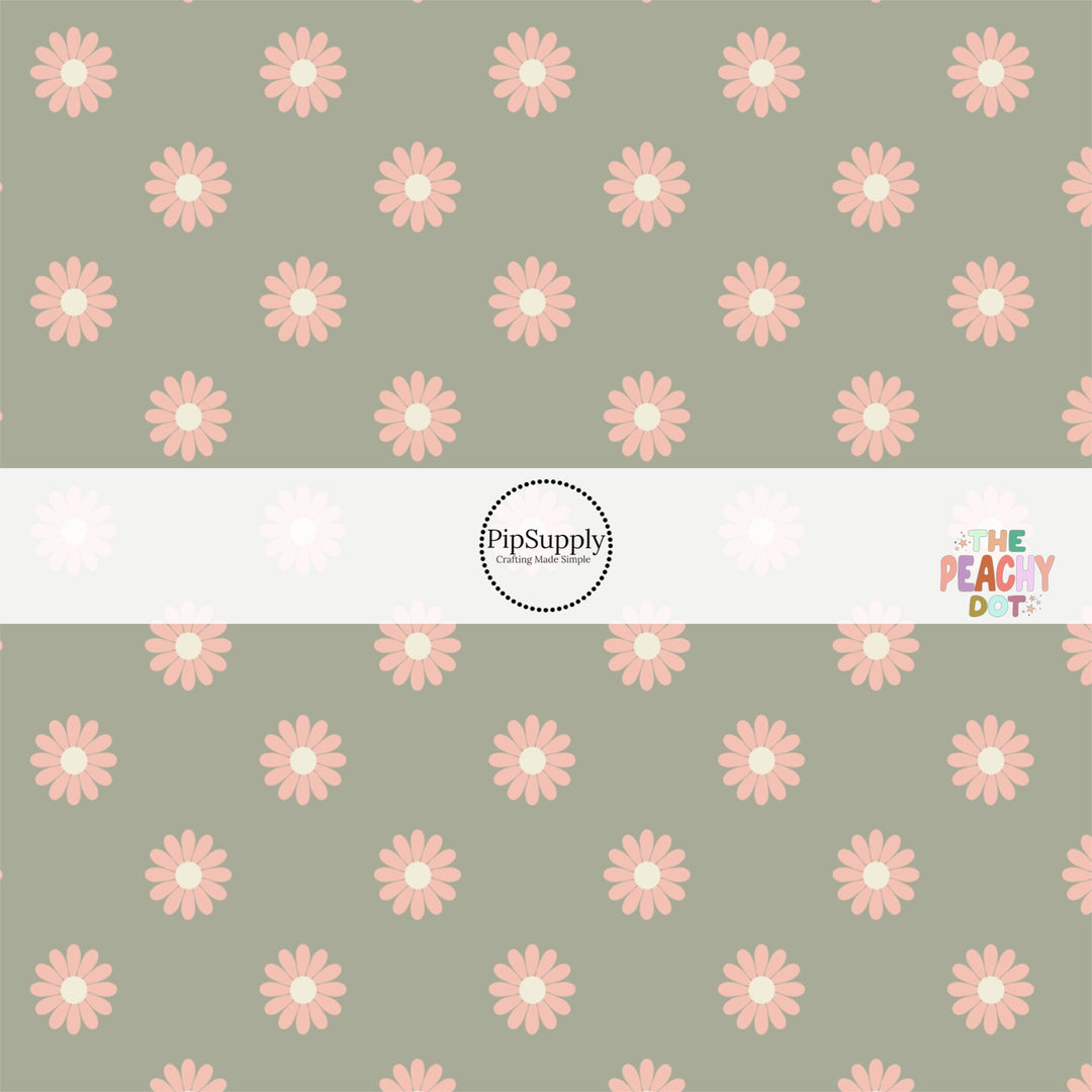 Sage green fabric by the yard with peach-colored daisies