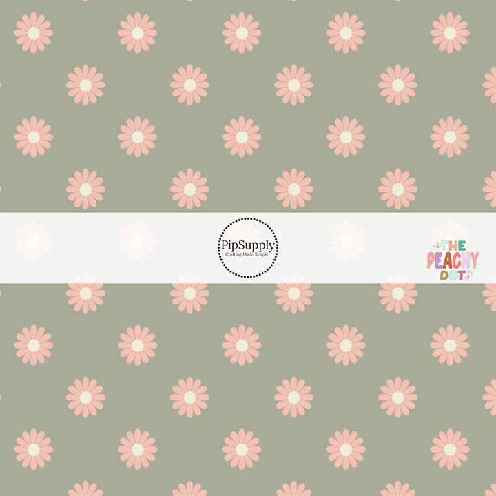 Sage green fabric by the yard with peach-colored daisies