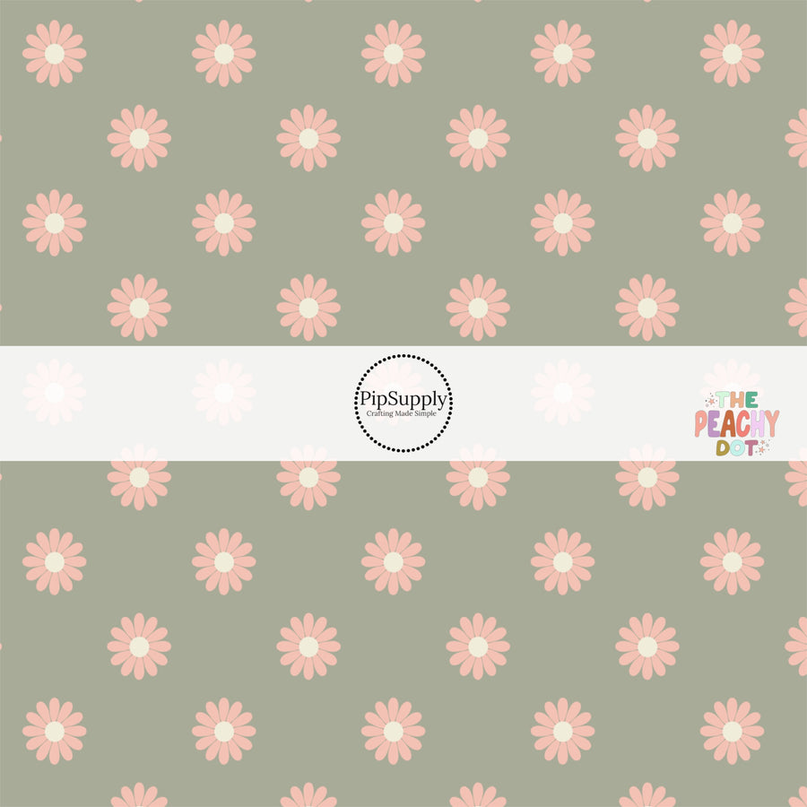 Sage green fabric by the yard with peach-colored daisies