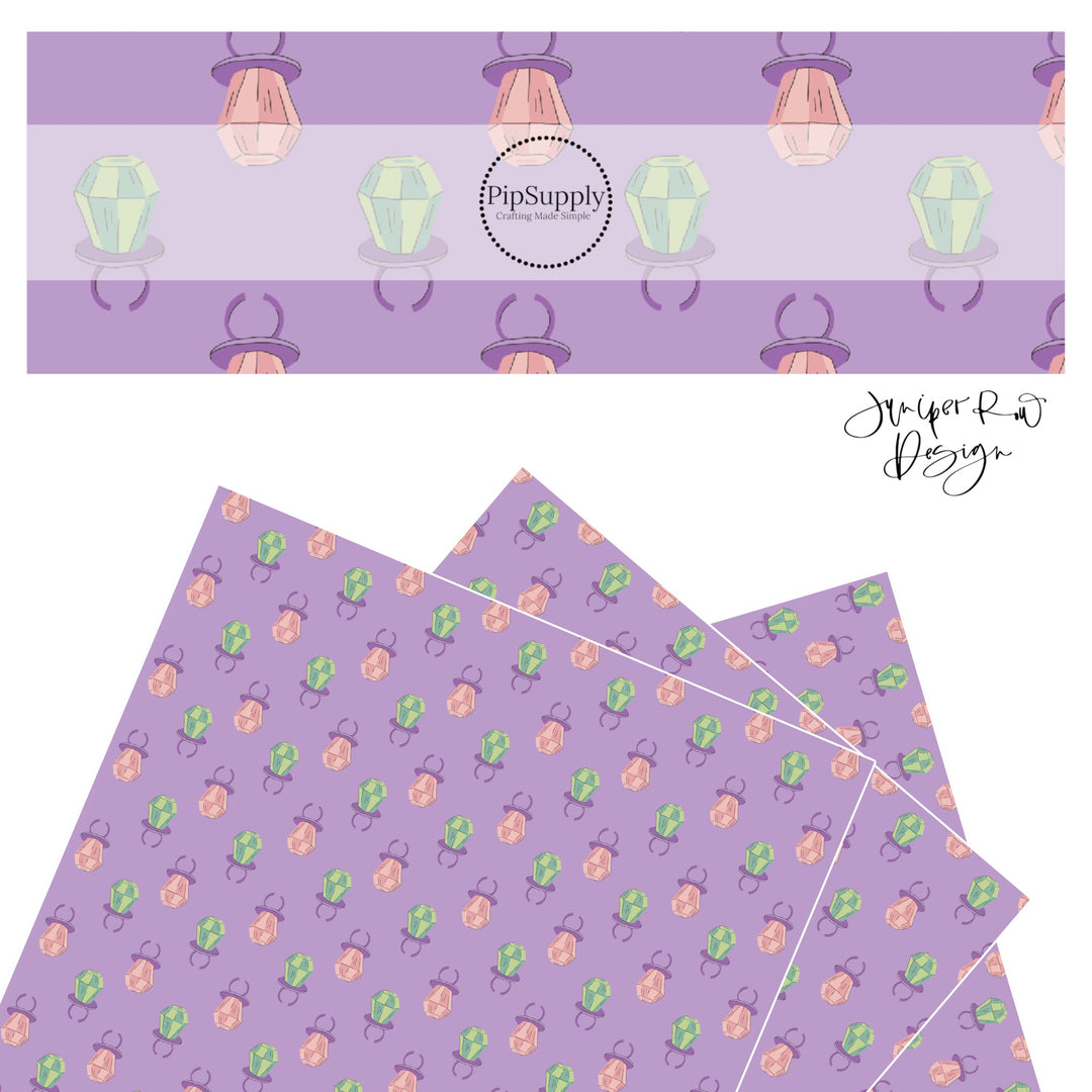 Pink and green candy on purple faux leather sheet