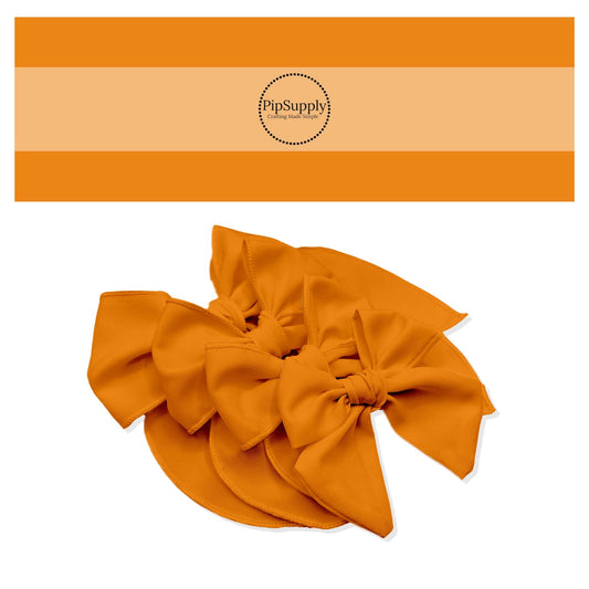 Tied Easter Carrot or Halloween Pumpkin Orange solid color hair bow strips in orange.