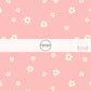 Light pink fabric by the yard with white scattered daisies