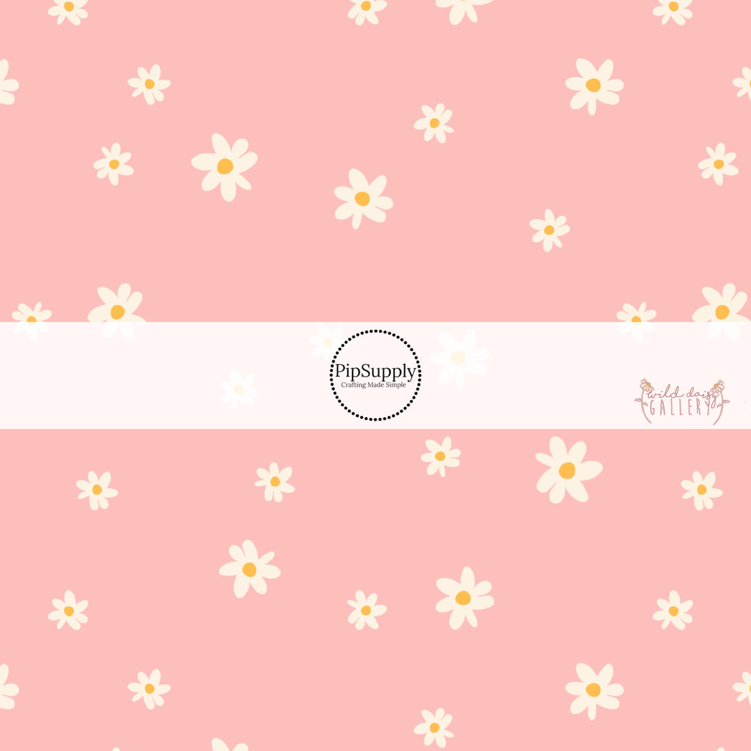 Light pink fabric by the yard with white scattered daisies