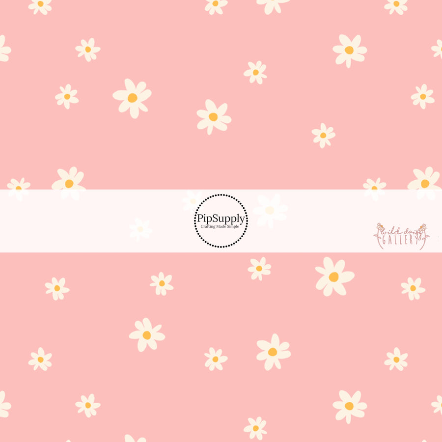 Light pink fabric by the yard with white scattered daisies