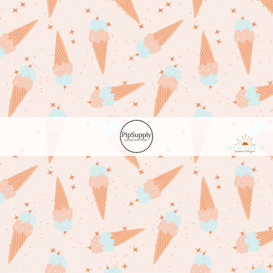 Cream fabric by the yard with scattered ice cream cones and stars.