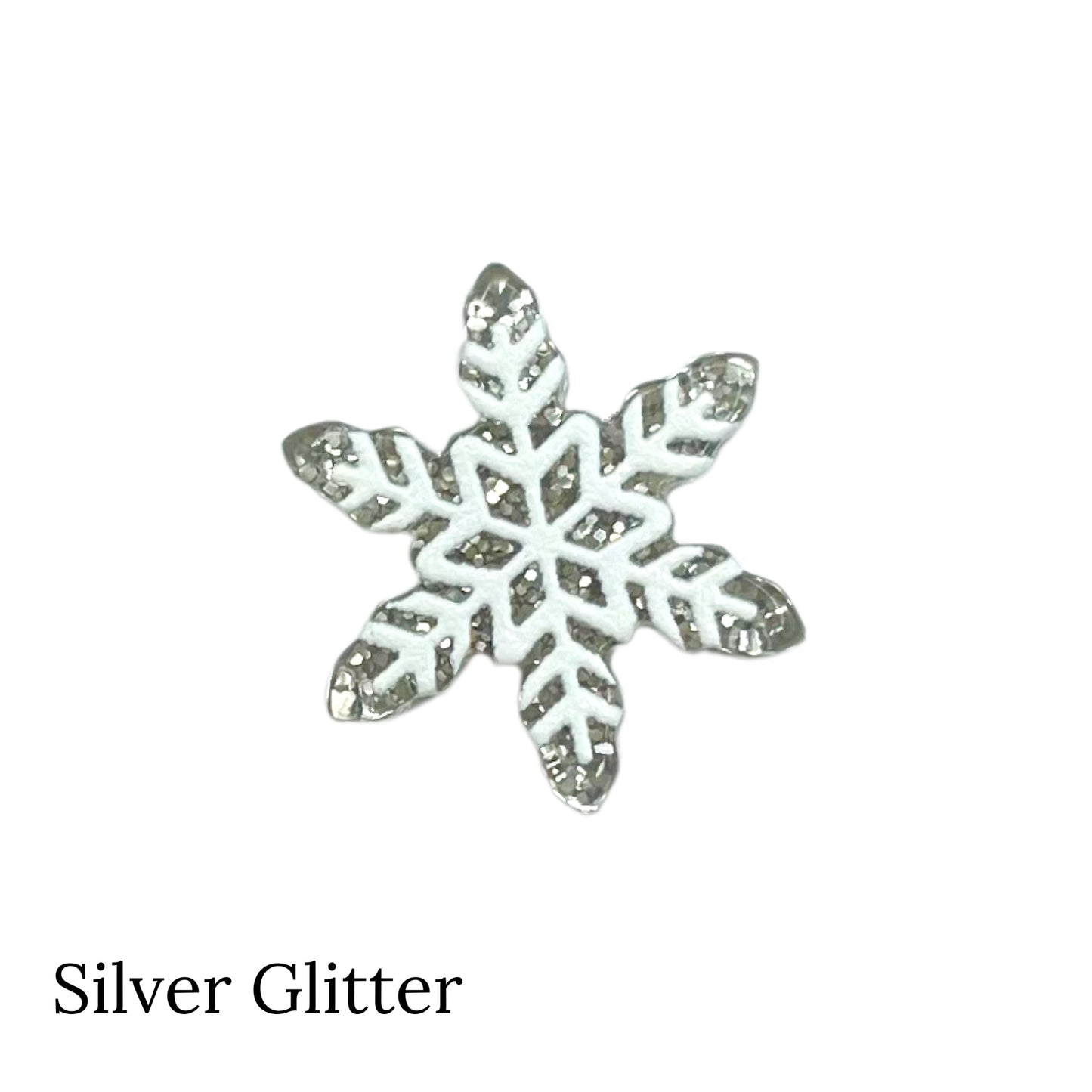 Silver Glitter Snowflake flat back resin on a white background