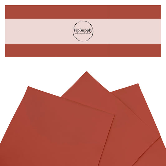 Smooth reddish marron faux leather sheets.