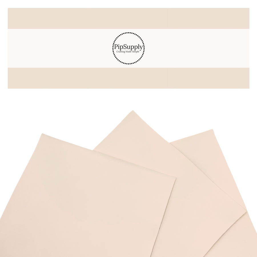 Smooth pale flesh pink faux leather sheets.