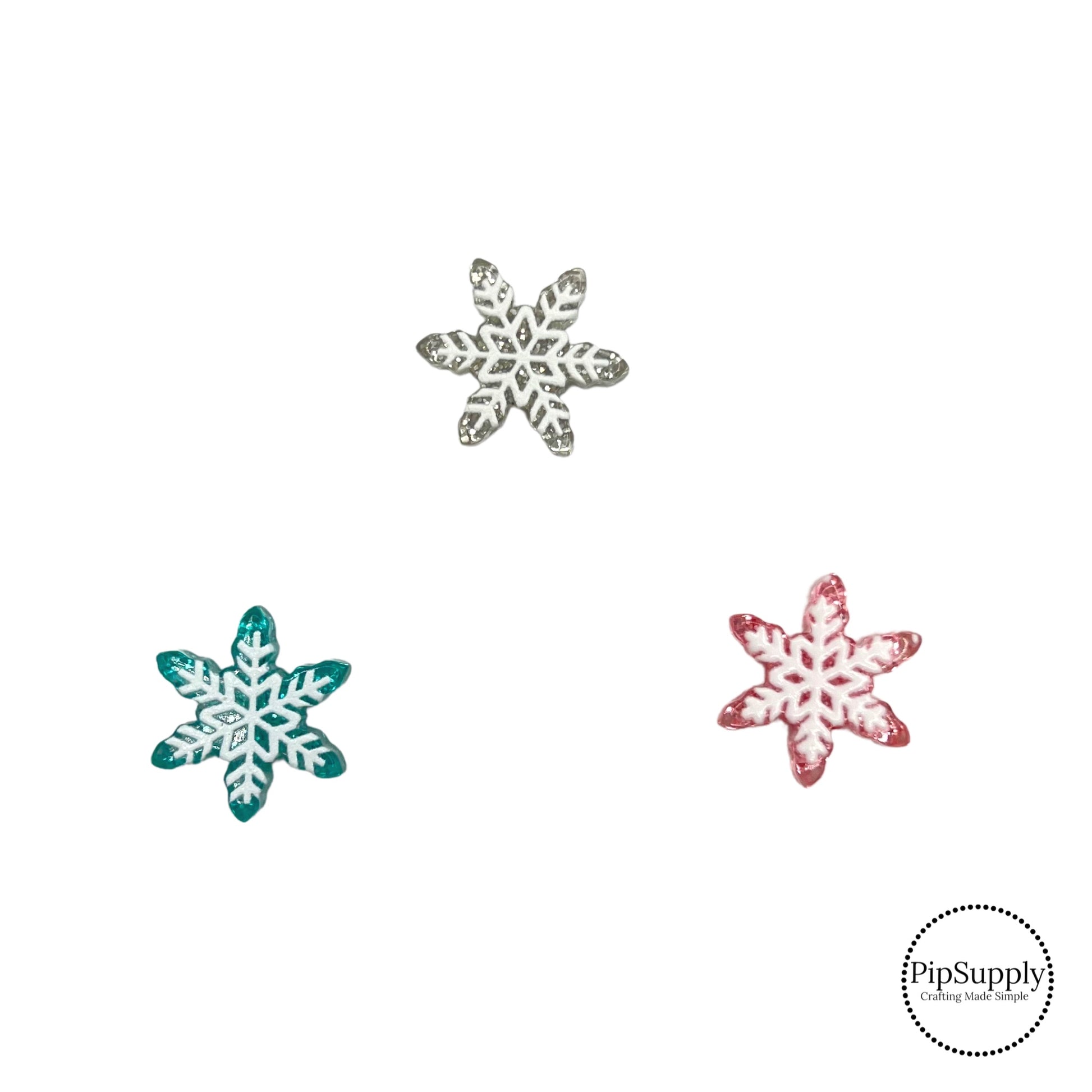 3 different multi color snowflake glitter charms in the colors pink, blue, and silver