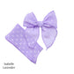 Spring frayed dot fabric bow strips. Lavender colored serger style bow strip.