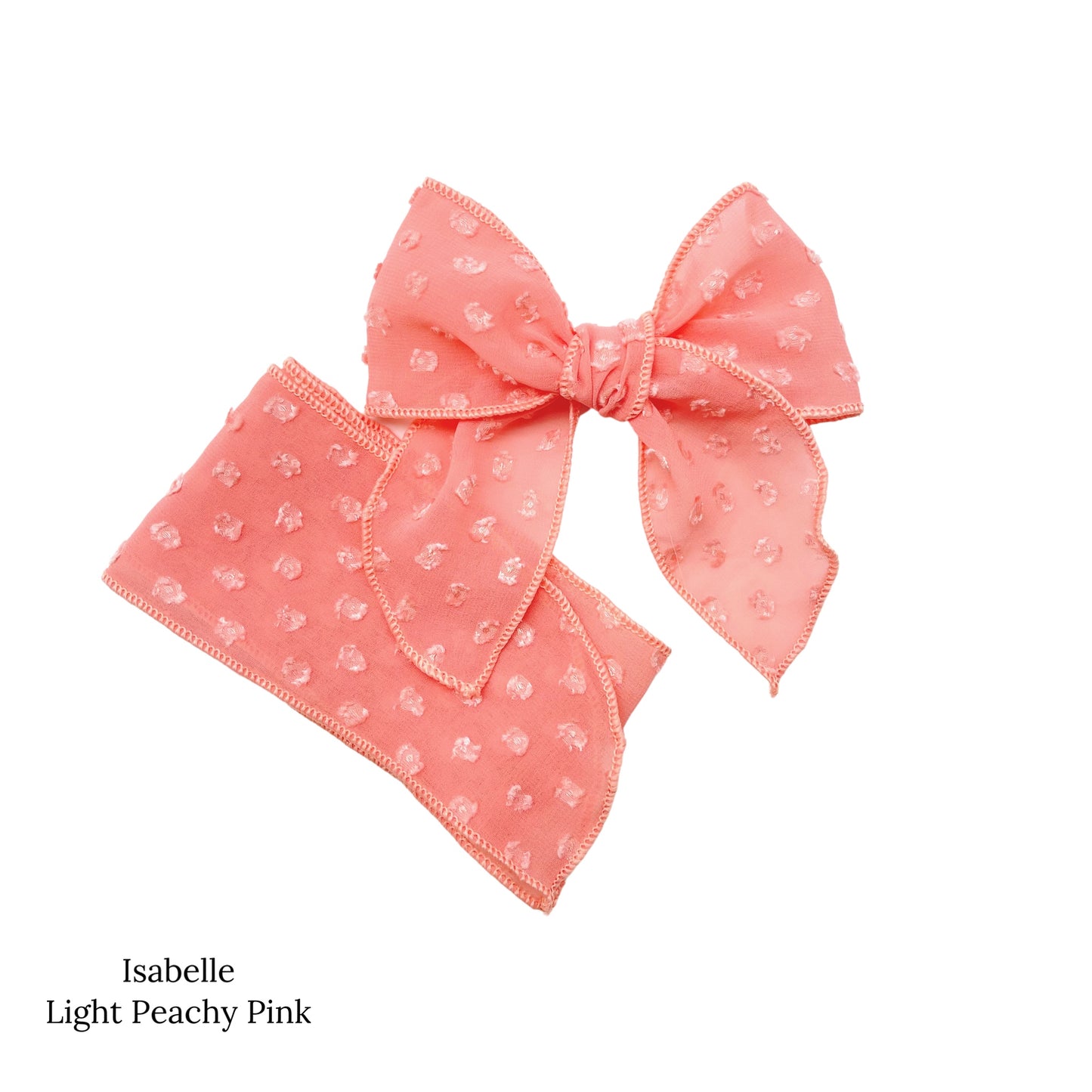 Spring frayed dot fabric bow strips. Light peachy pink colored serger style bow strip. 
