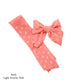 Spring frayed dot fabric bow strips. Light peachy pink colored sailor style bow strip. 