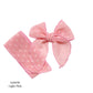 Spring frayed dot fabric bow strips. Light pink colored serger style bow strip.