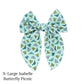 Spring meadow pattern bow strips. Butterfly picnic print x-large serger style bow strip. 