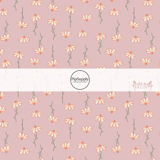 Dusty rose colored fabric by the yard with white daisies on green stems