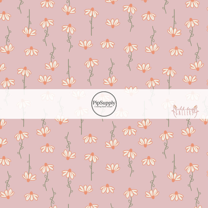 Dusty rose colored fabric by the yard with white daisies on green stems