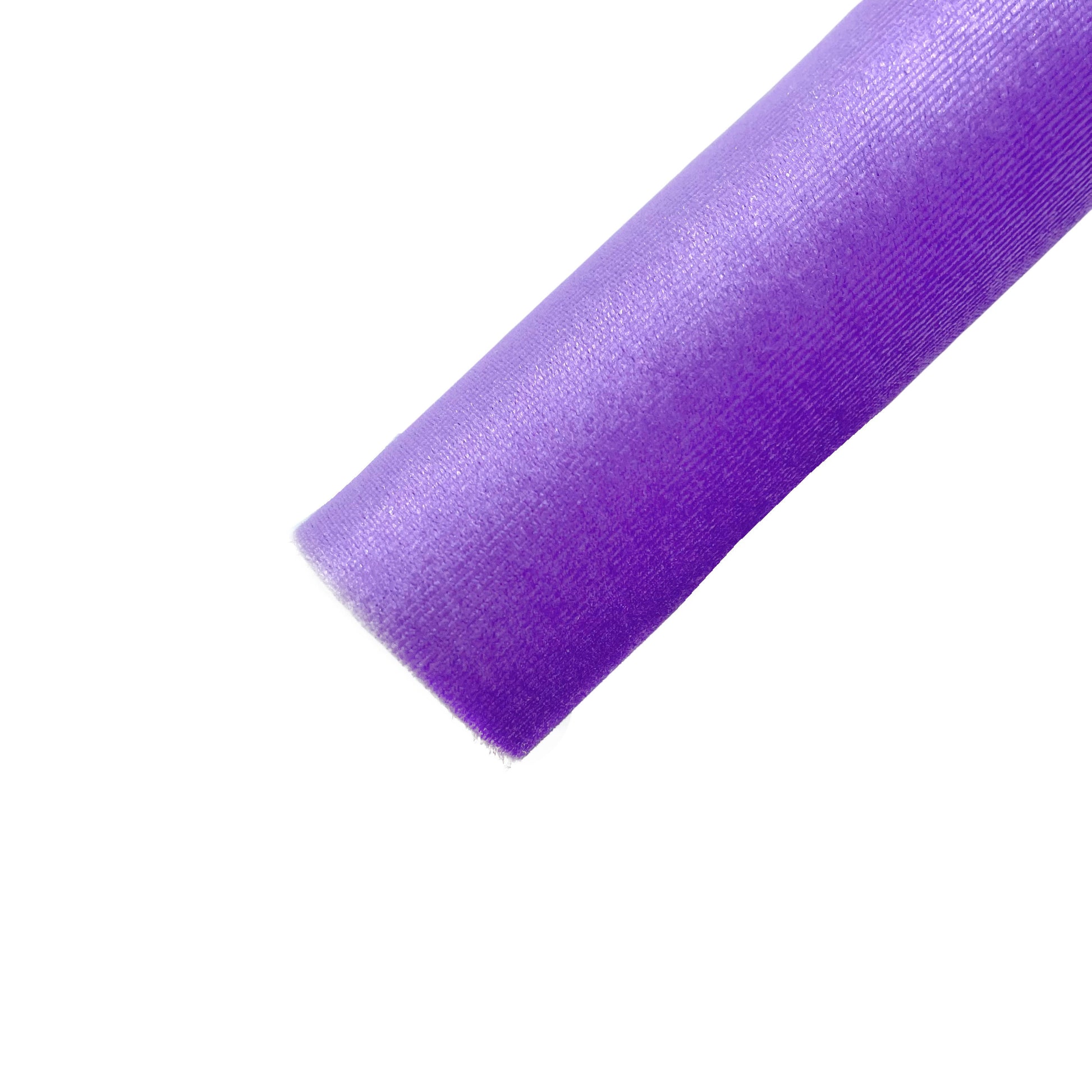 Rolled solid colored velvet sheet in violet purple.