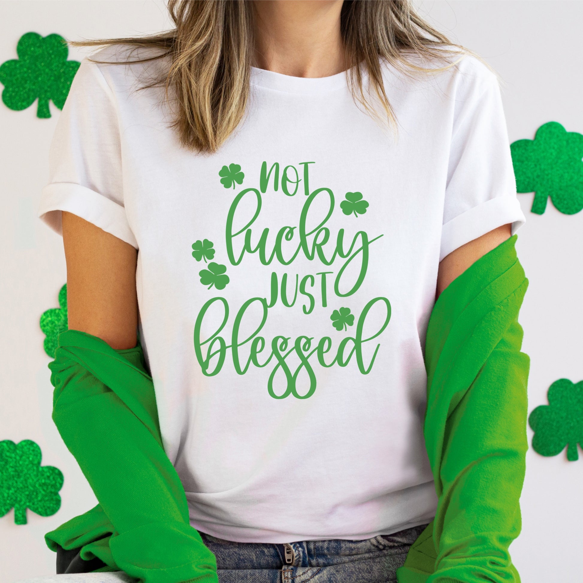 "Not Lucky, Just Blessed" Green Cursive St. Patrick's Day Iron-On heat transfer with tiny shamrocks