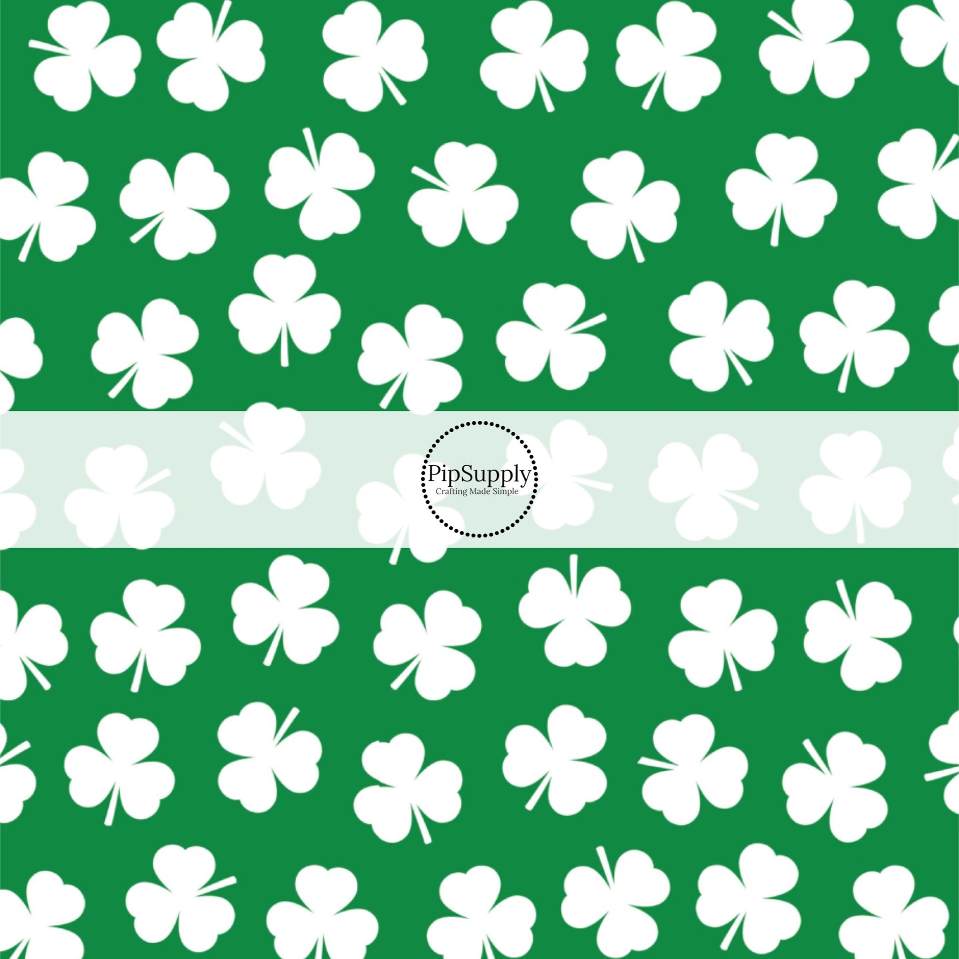 Green fabric by the yard with scattered white clovers