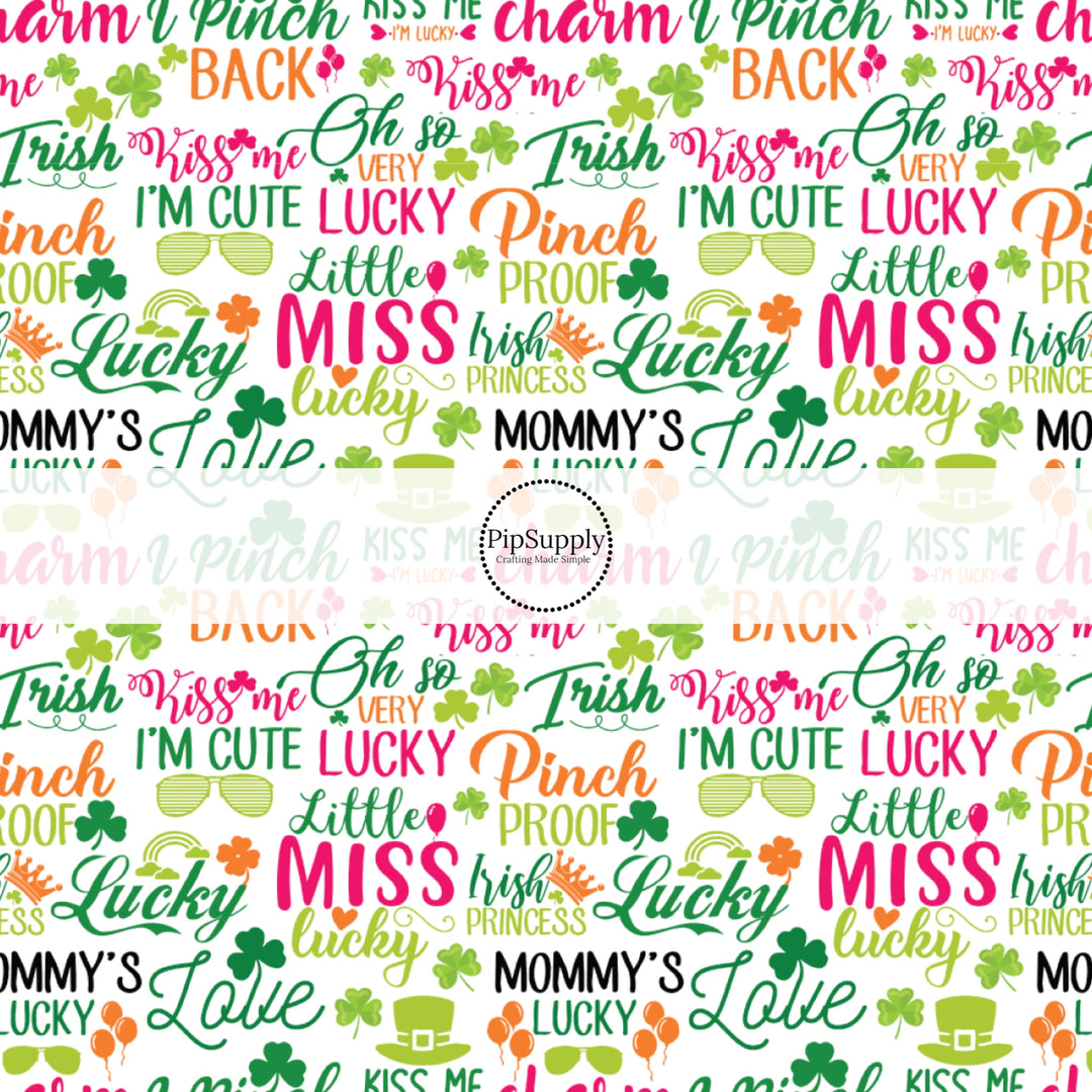 Colorful "irish princess, kiss me, i'm lucky, oh so very lucky, pinch proof" sayings on white fabric by the yard