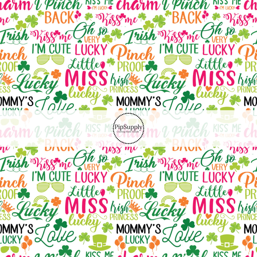 Colorful "irish princess, kiss me, i'm lucky, oh so very lucky, pinch proof" sayings on white fabric by the yard