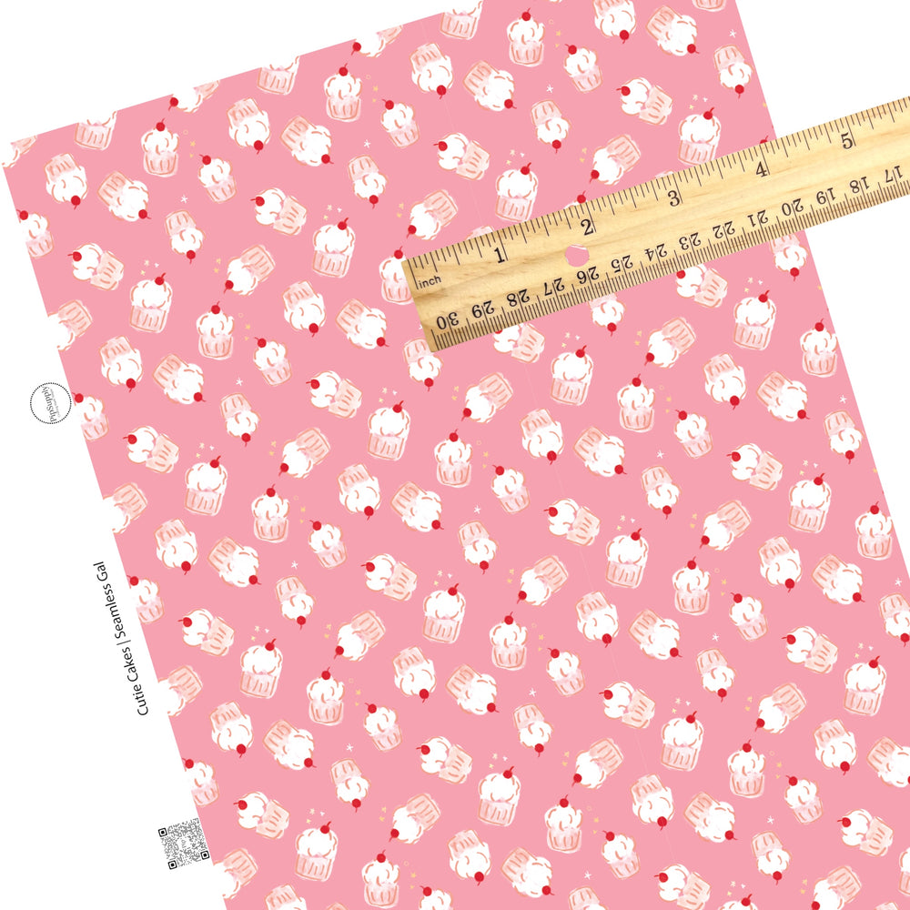 White stars with cupcakes on pink faux leather sheet