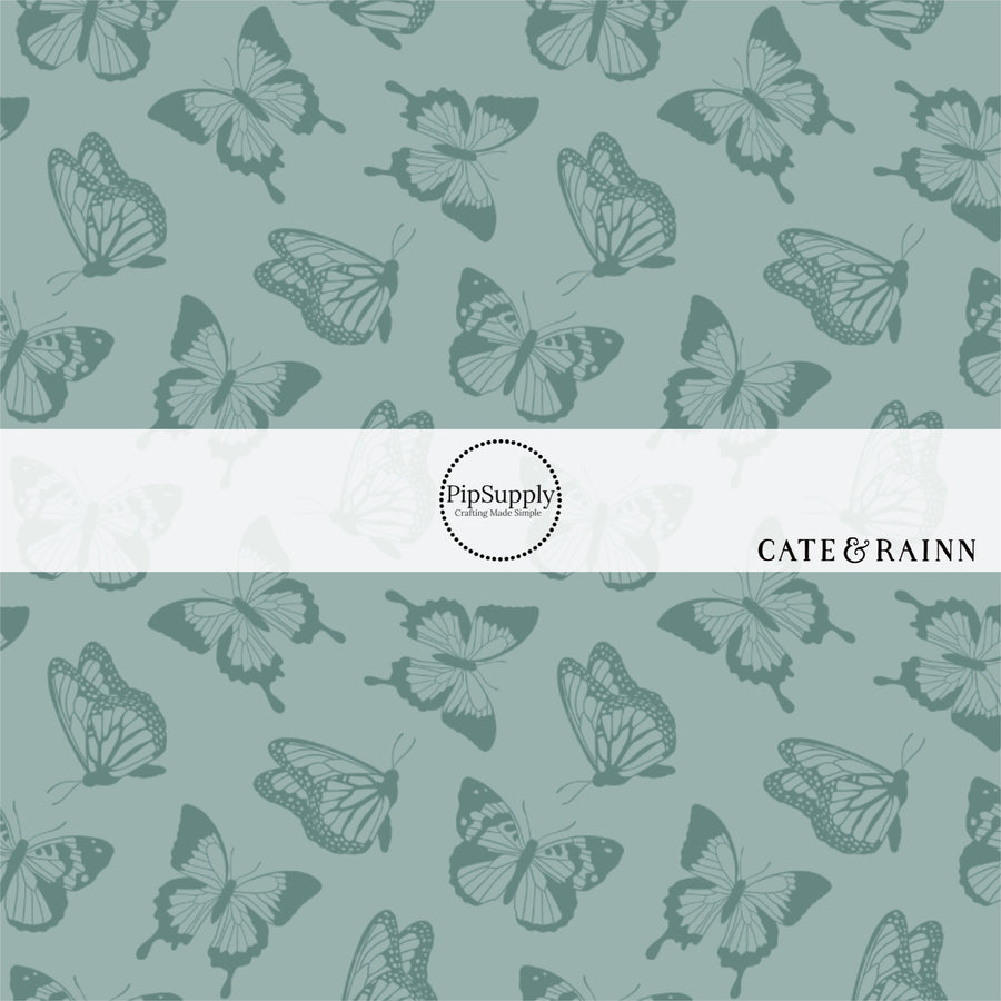 Light Teal Fabric by the yard with butterfly silhouettes