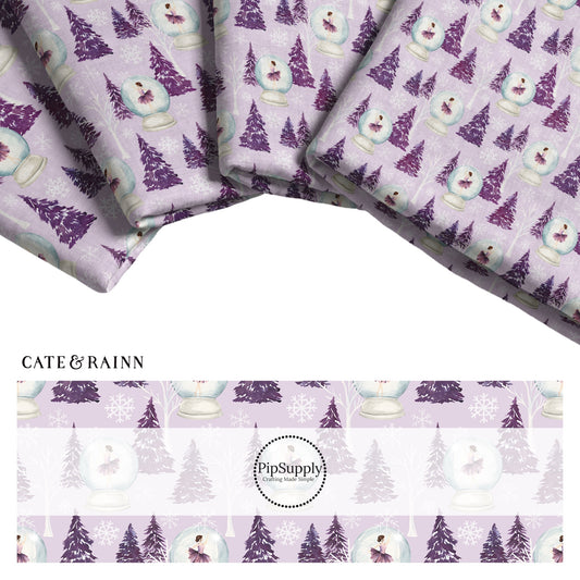 Purple fabric stack with fairies and snowglobes