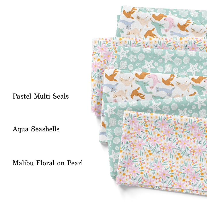 Indy Bloom summer fabric collection with floral, animal, and seashells patterns. 