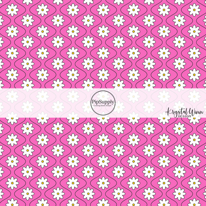 Hot pink fabric by the yard with white daisies and thin black wavy lines.