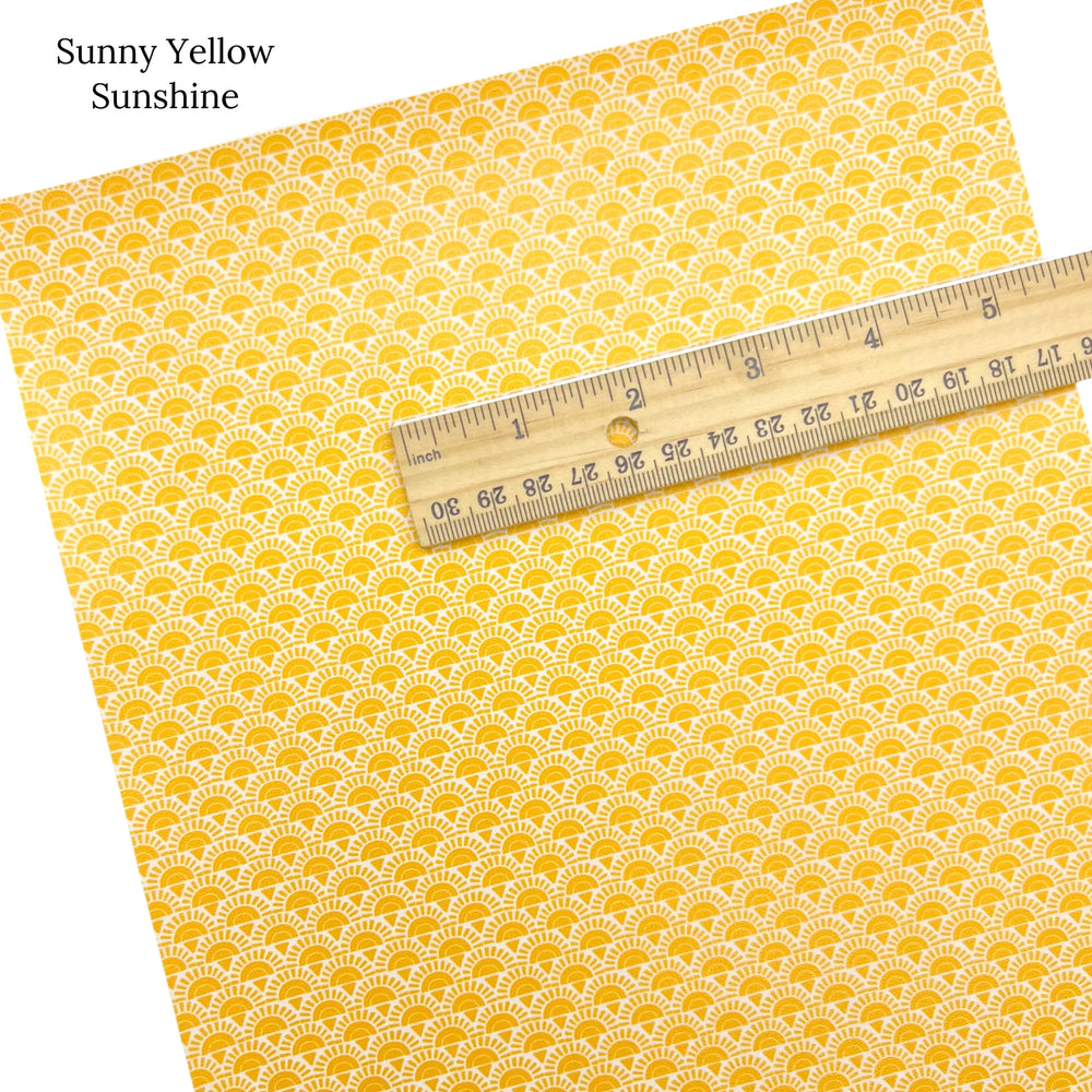 Bright yellow sun pattern faux leather sheet.