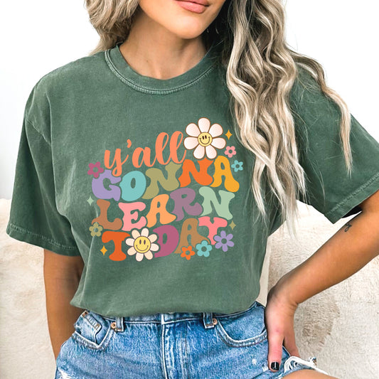 Vibrant multi colored daisies and the phrase "Y'all Gonna Learn Today" iron on heat transfer.