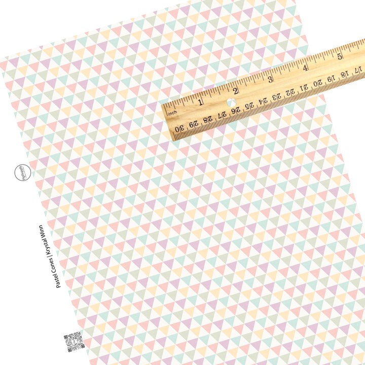 Light green, light blue, light yellow, pink, and purple cones on a distressed faux leather sheets