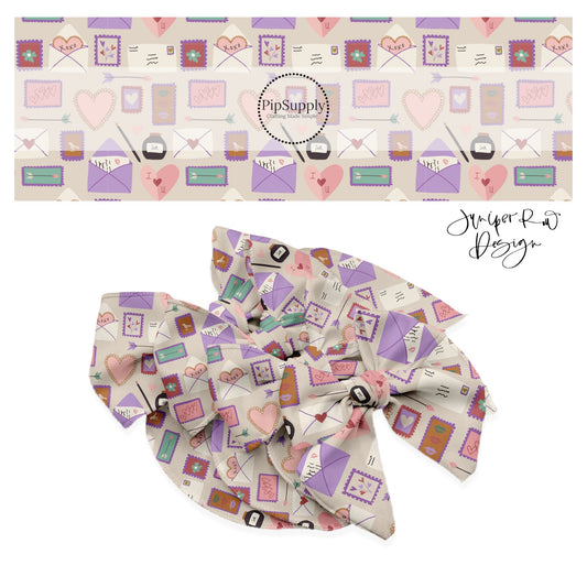Cream bow strips with opened letters and stamps with pink hearts notes