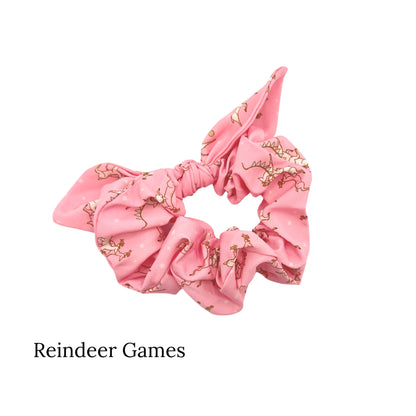 Pink scrunchie bow with prancing reindeer