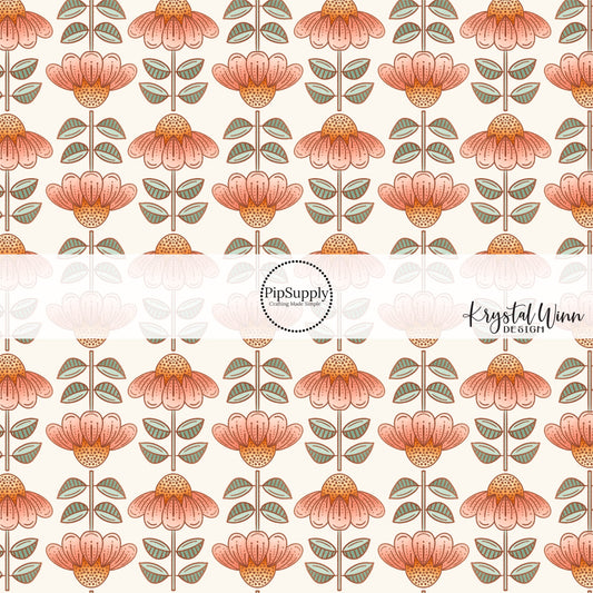 Cream fabric by the yard with Orange and Peach colored cone-shaped flowers