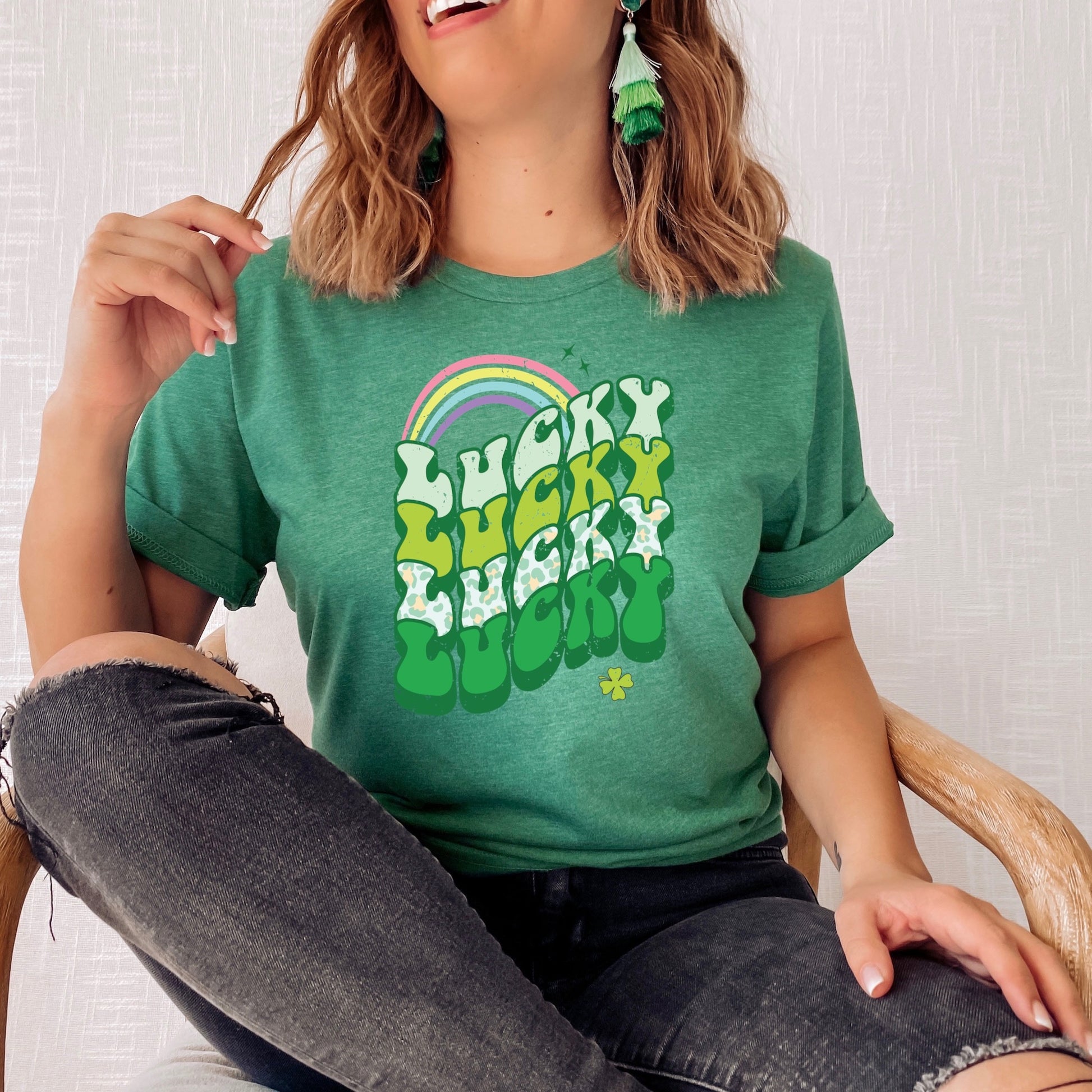 Green T-Shirt with the phrase "Lucky" and a rainbow and clover - St. Patricks Day Iron on DTF Transfer 