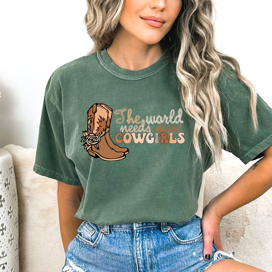 "The word needs more cowgirls" cowgirl boots and western rodeo themed iron on heat transfer.