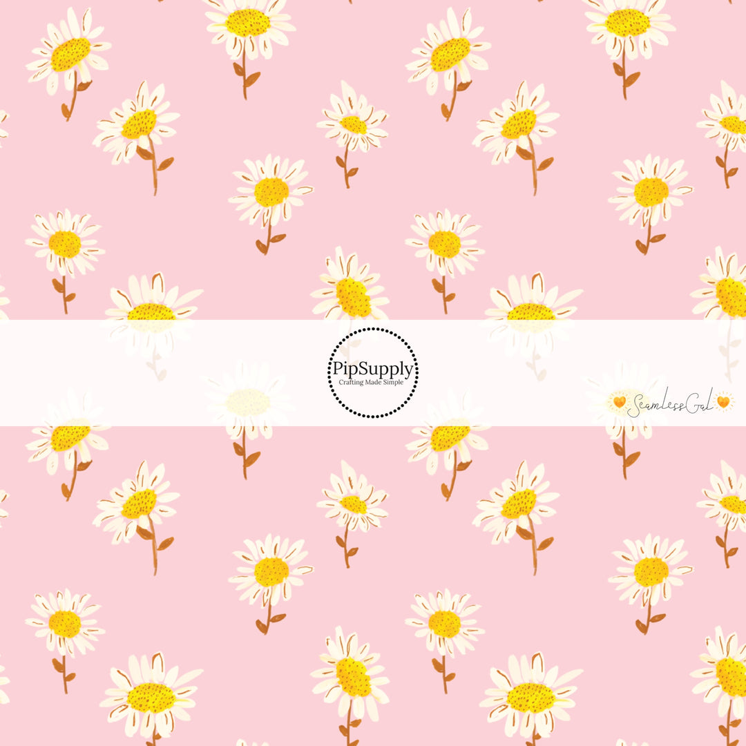 Scattered painted white daisies on light pink fabric by the yard