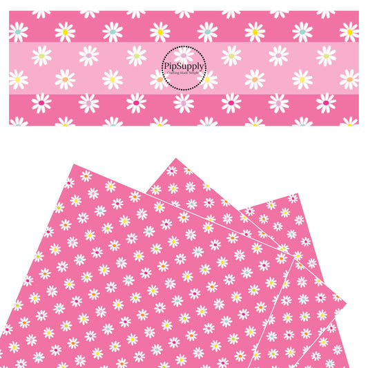 White flowers with multi centers on pink faux leather sheet