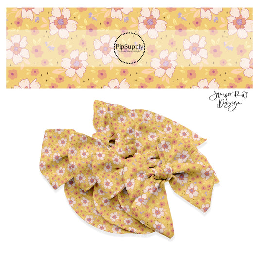 Light pink big flowers with tiny pink flowers on yellow bow strips