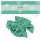 Hot pink and white connected hearts on a teal green bow strip