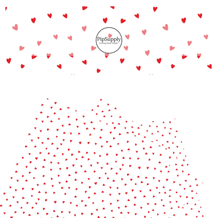 Scattered red hearts on a white faux leather sheet